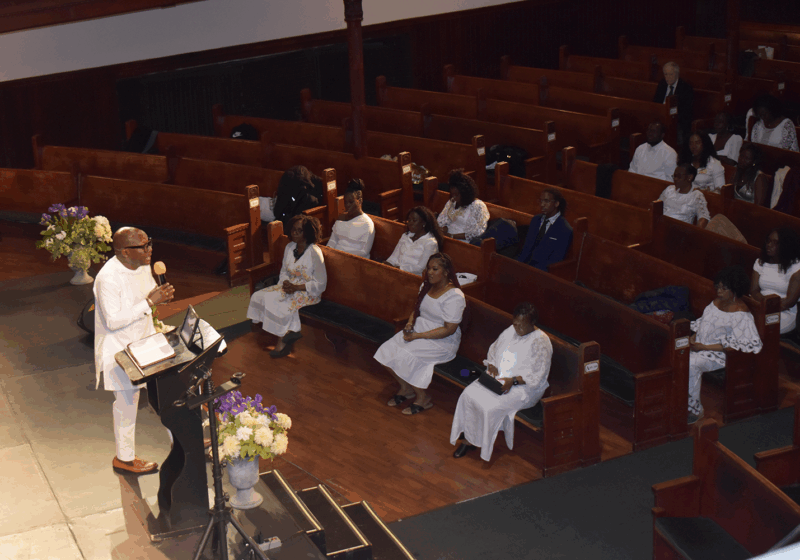 Pastor preaching a message to congregation on Easter Sunday
