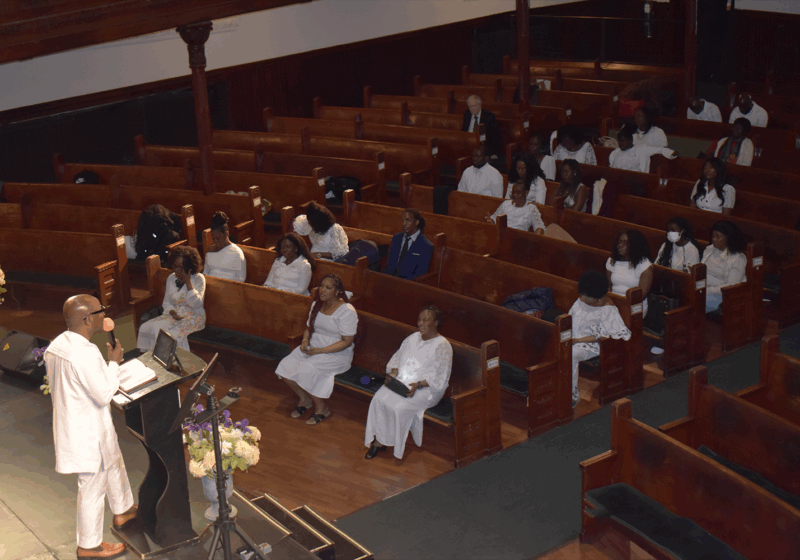 Pastor preaching a message to congregation on Easter Sunday